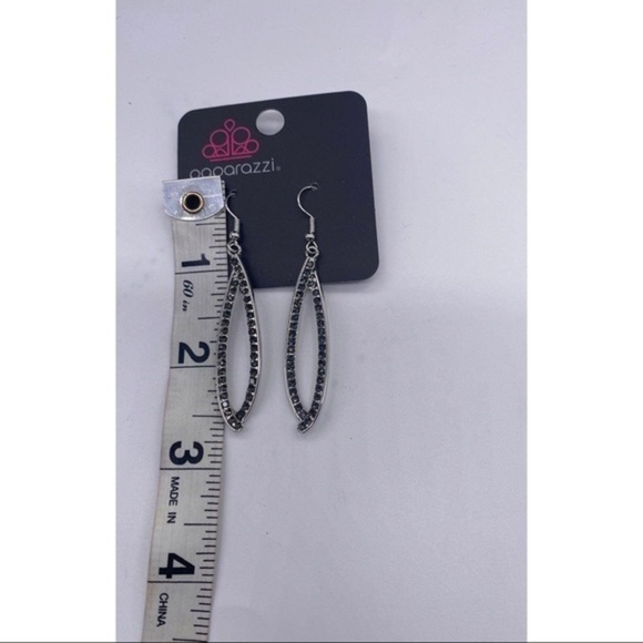 Treasure Trove Trinket- Sliver Earrings
Item 111B - Picture 3 of 4